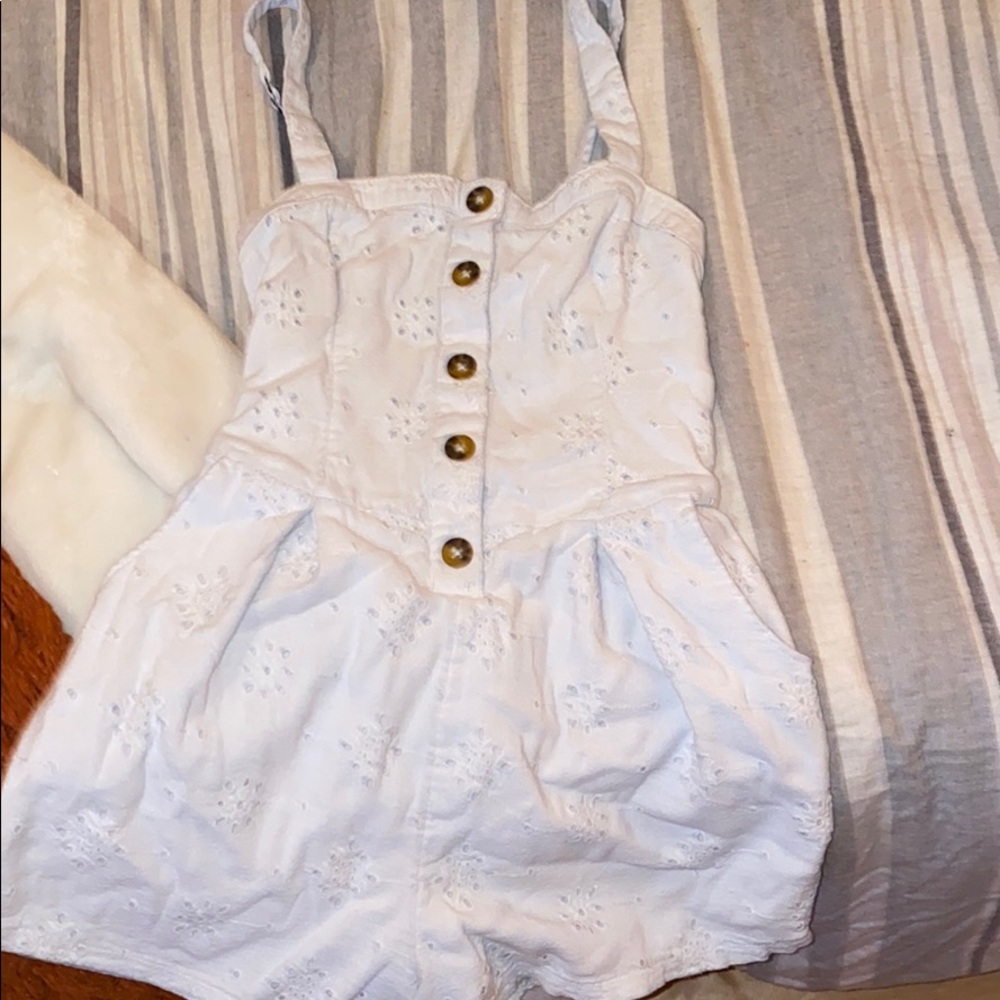 white floral romper w brown buttons